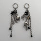 skull charm earrings